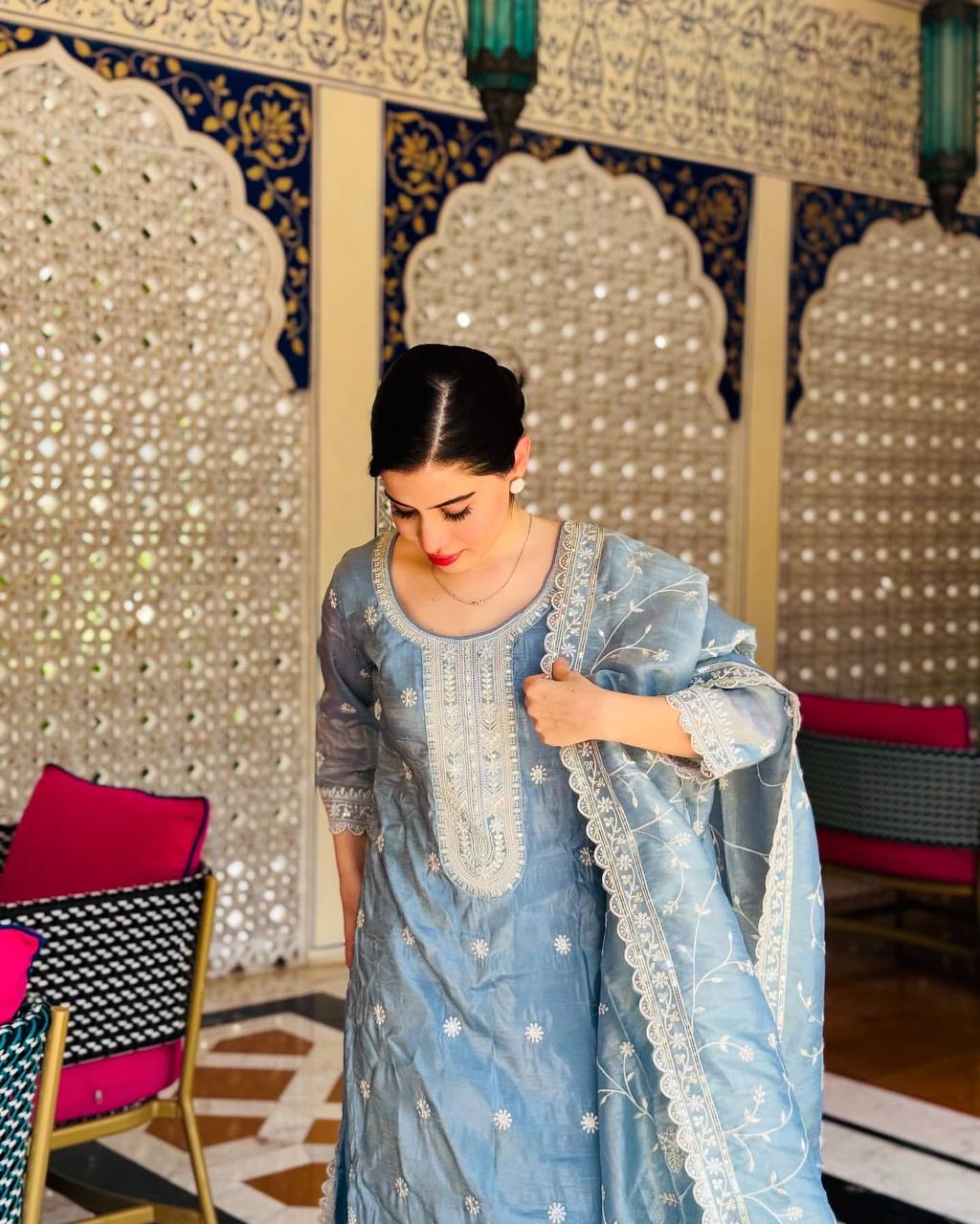 Elegance in Blue A Woman's Empowering Presence